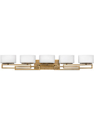 Lanza 5 Light Bath Sconce with Etched Opal Glass Shades in Brushed Bronze.